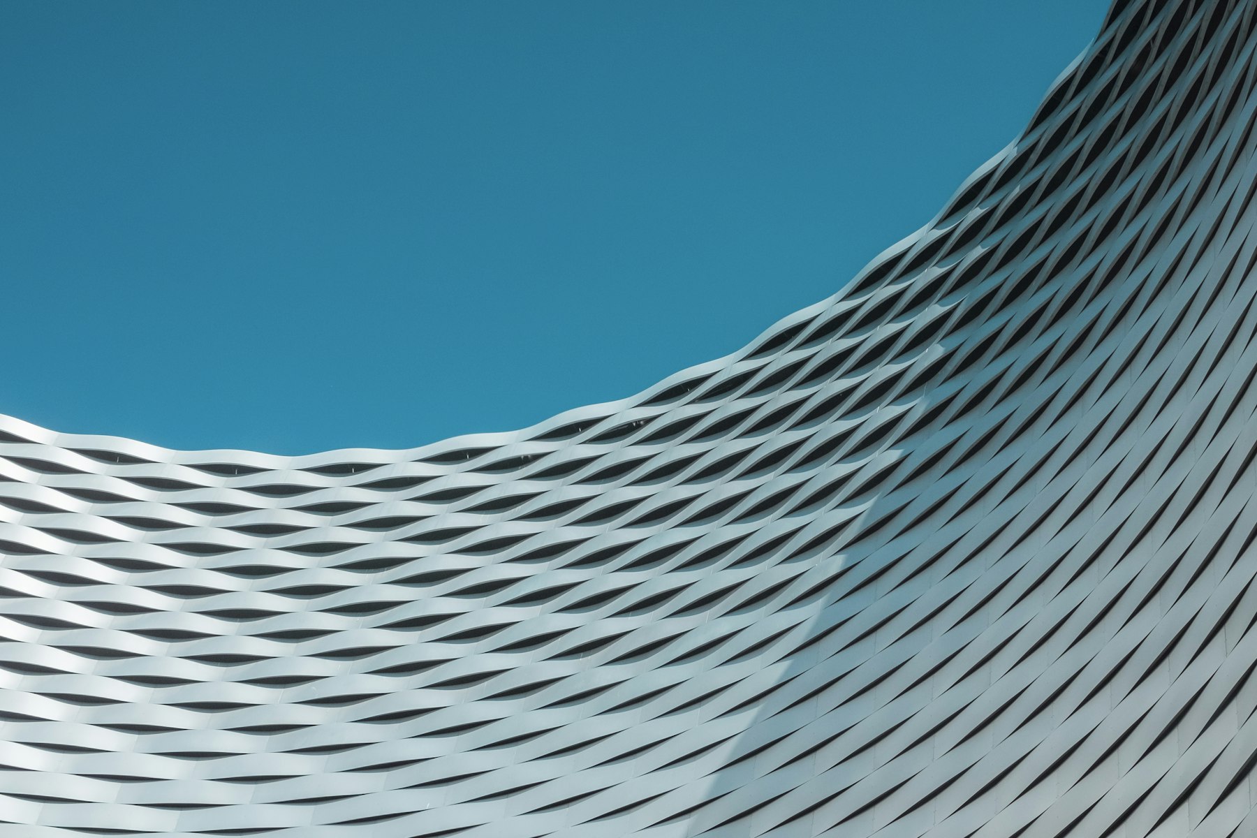 An abstract wave of architectural louvres