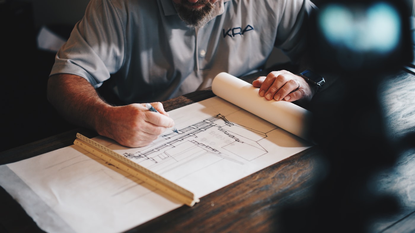 Technical drawings and blueprints on a work table